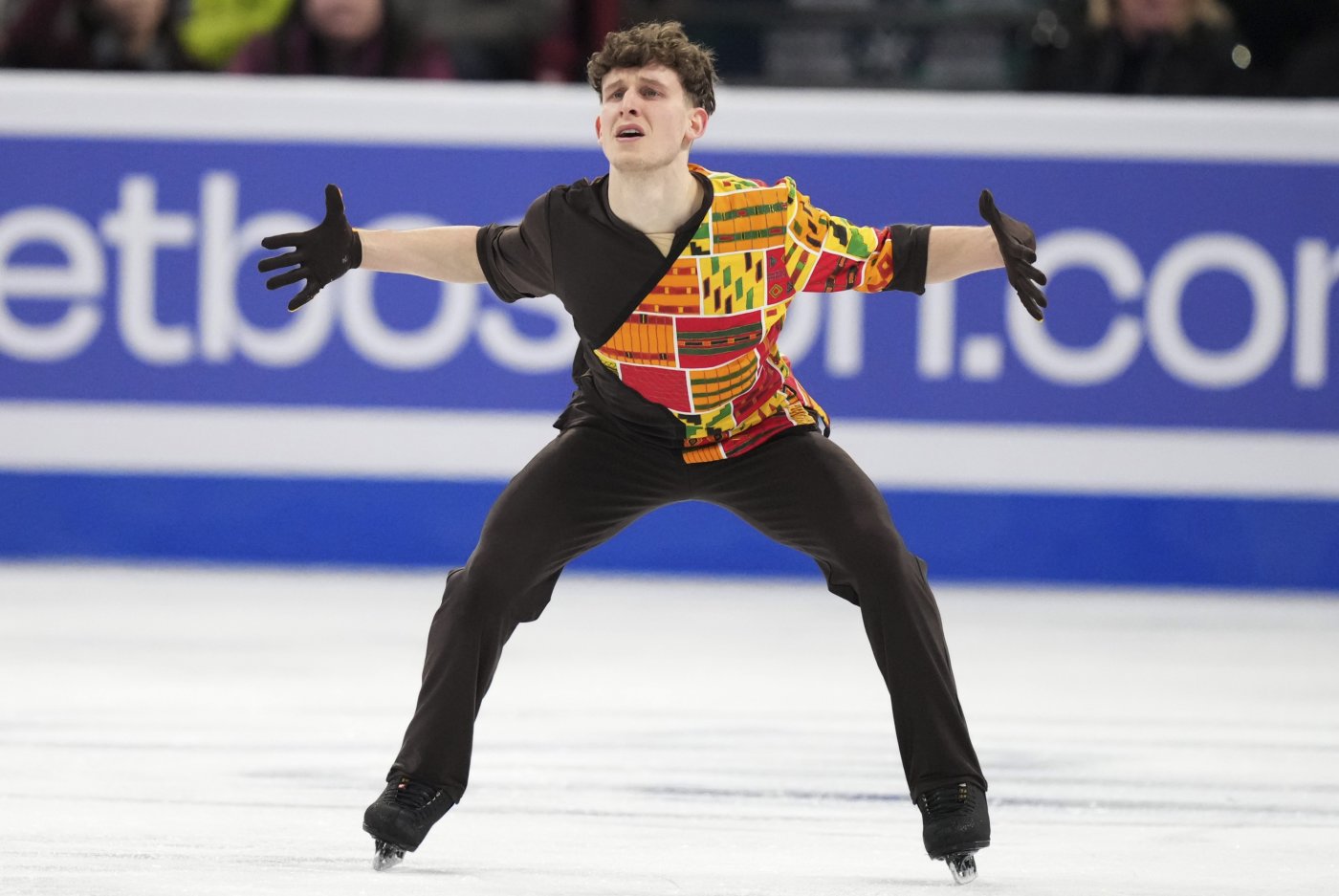 Lukas Britschgi, of Switzerland, performs his free skate routine at the world figure skating championships Saturday, March 23, 3024, in Montreal. (Christinne Muschi/The Canadian Press via AP)